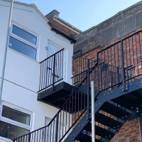 An image of a metal fire escape staircase we fabricated