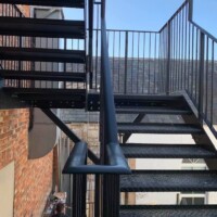 An image of a metal fire escape staircase we fabricated